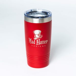 Red Camel tumbler with Mad Hatter logo on it